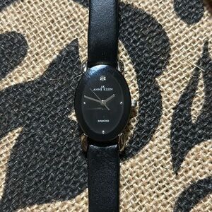 Anne Klein is a vintage women’s black wristwatch preloved